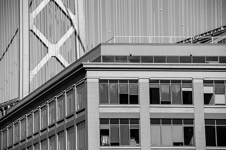 Building and Bay Bridge detail, from Main St near Harrison looking East, San Francisco.  R. Blum and Associates Commercial Real Estate Appraisal. Photo 2014.